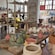 A table full of pomegranate shaped sculptures in a pottery workshop in Rhodes Town, Greece